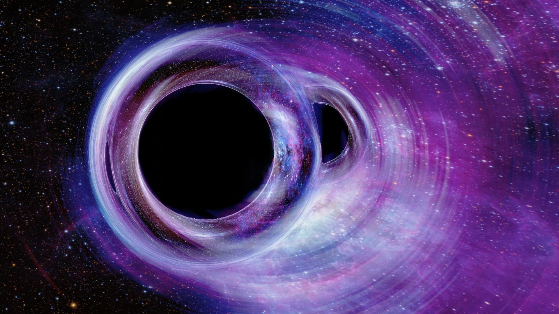 NASA obrázek dne: Chyceni v síti: Vizualizace splynutí černých děr v mlhovině Tarantule